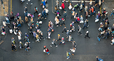 Aerial View of Crowd Walking In Street